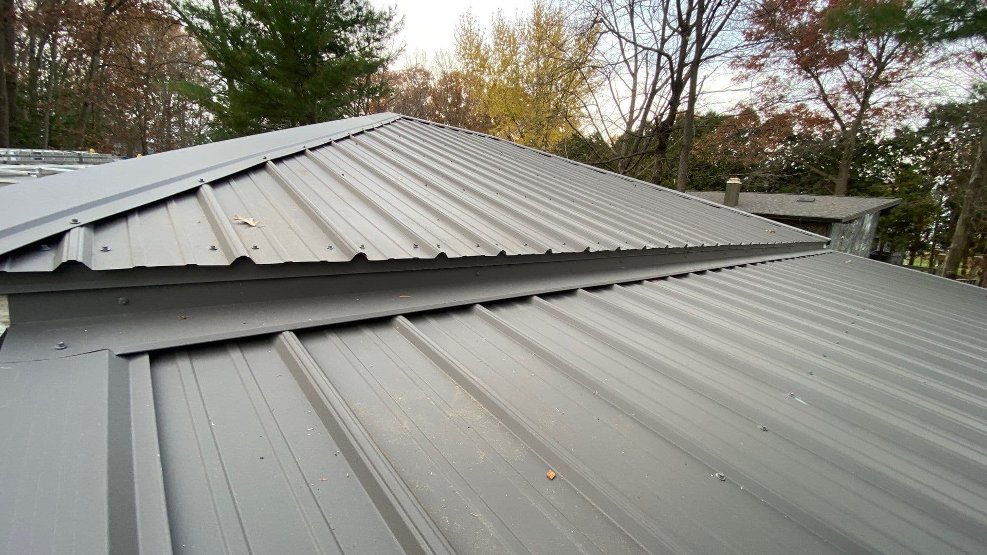 Gallery photos for Old Shingles Out R-Panel Metal Roof In New Lisbon WI: Image #5