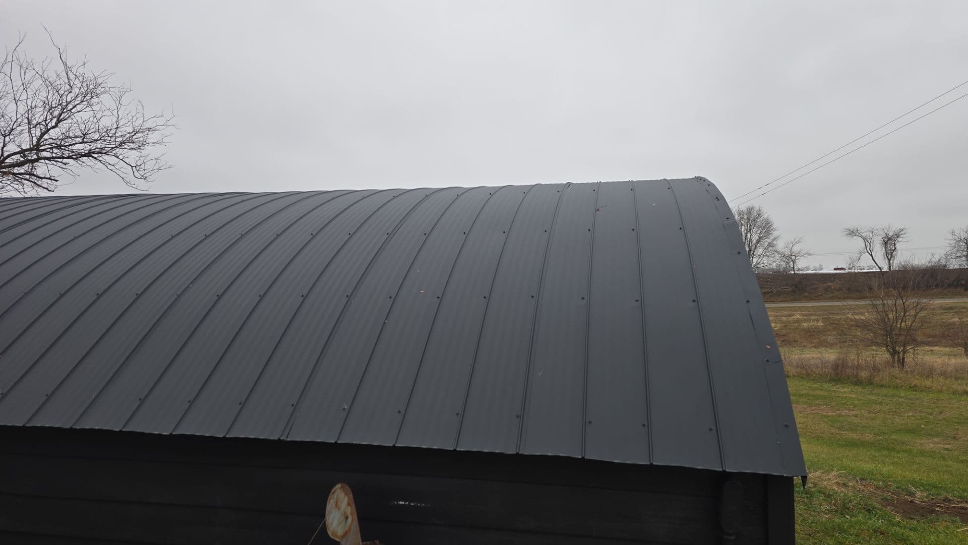 Gallery photos for New Black Flex Metal Roof on Outdated Barrel Roof in Potosi WI: Image #2