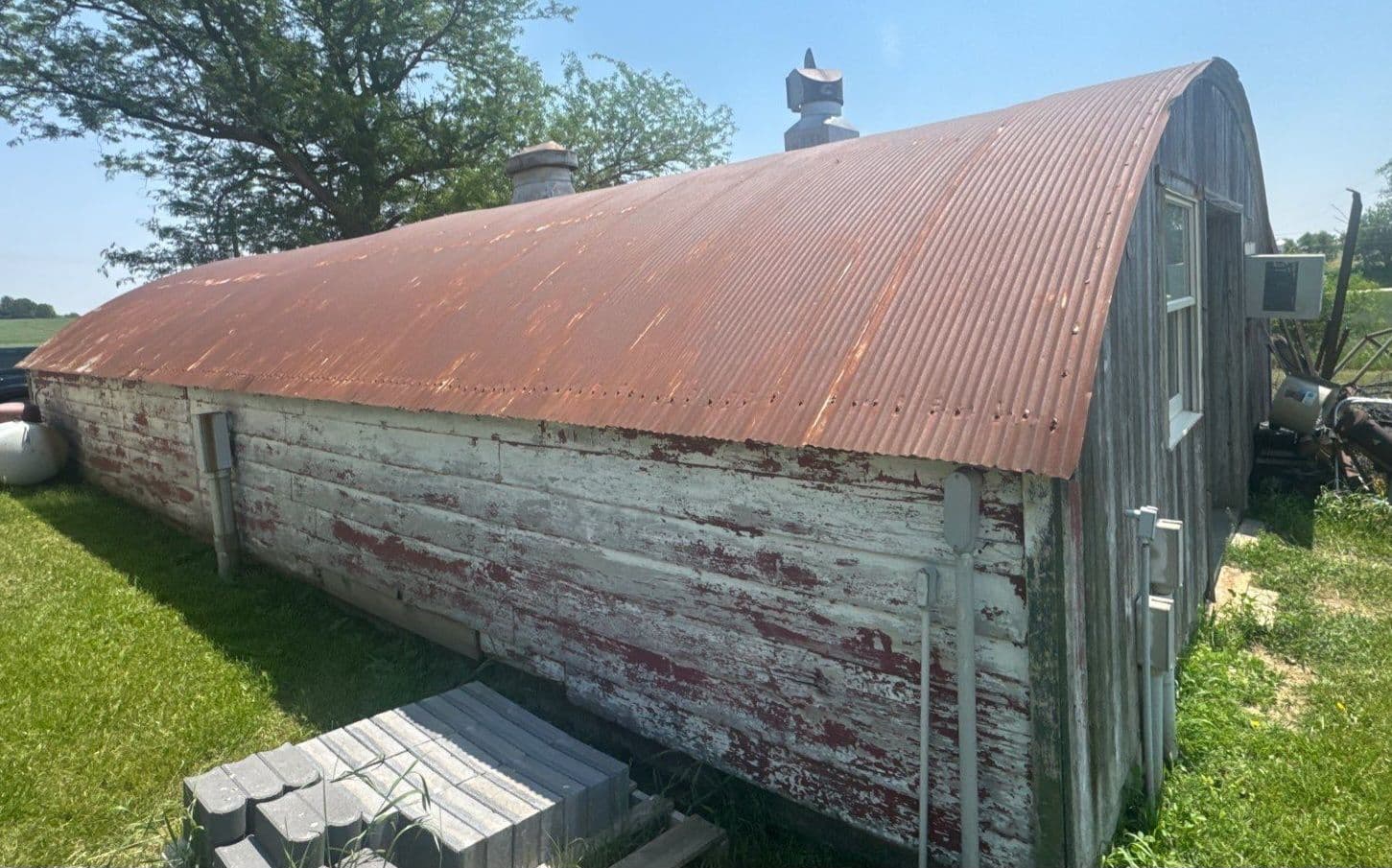 New Black Flex Metal Roof on Outdated Barrel Roof in Potosi WI