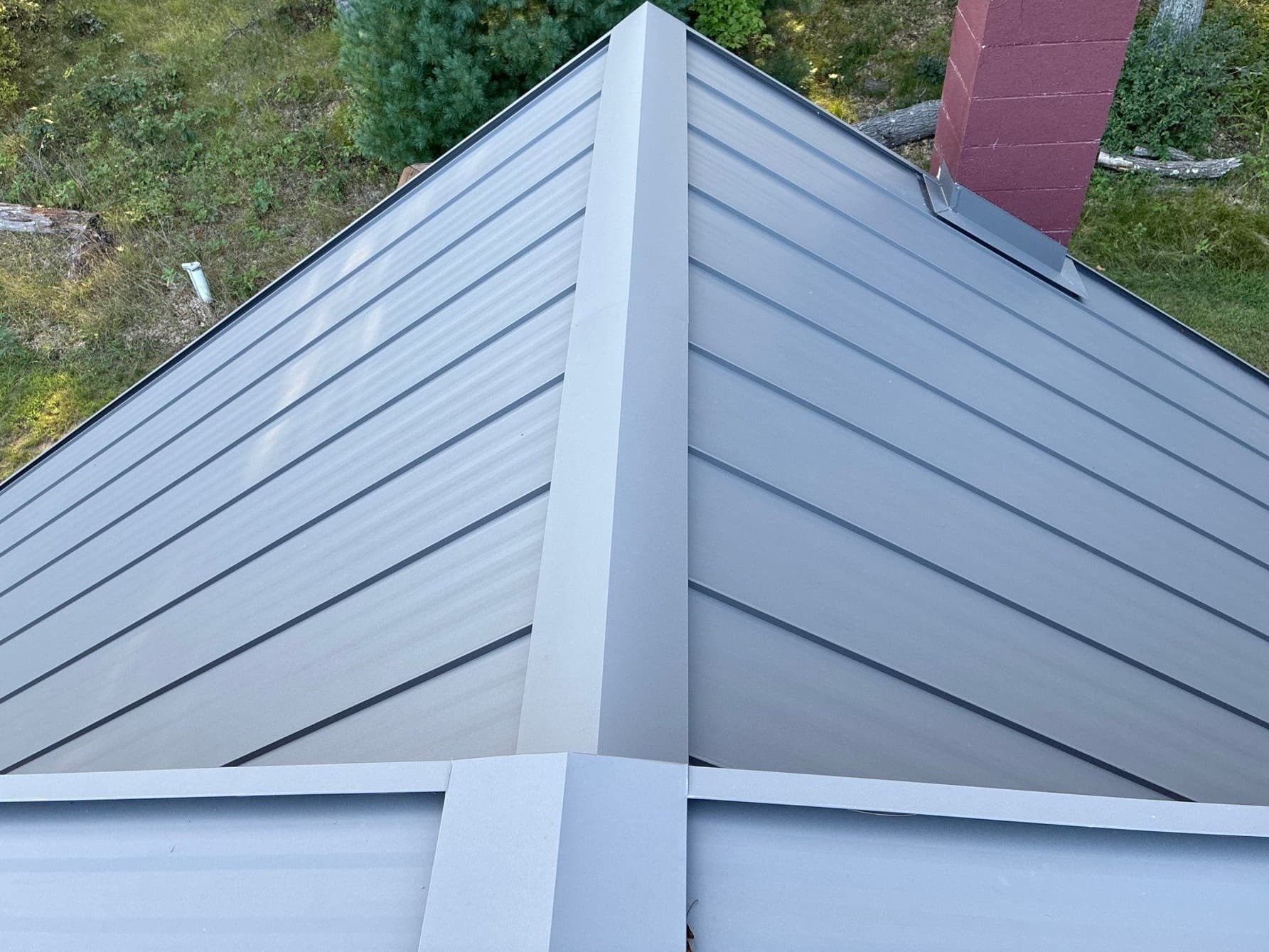 Gallery photos for Shingles to Standing Seam Metal Roof on a Grand Marsh Log Home: Image #1