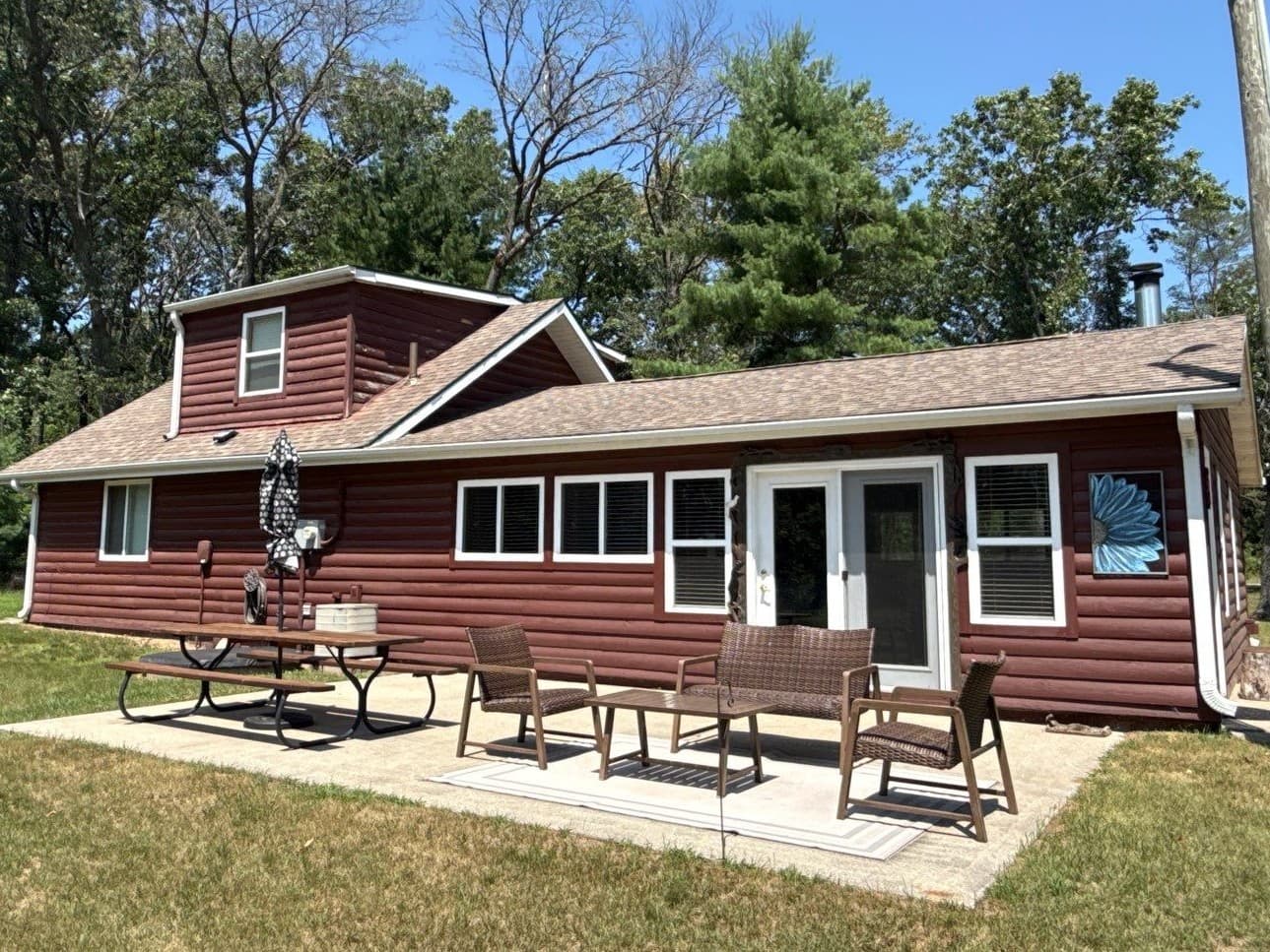 Gallery photos for Shingles to Standing Seam Metal Roof on a Grand Marsh Log Home: Image #3