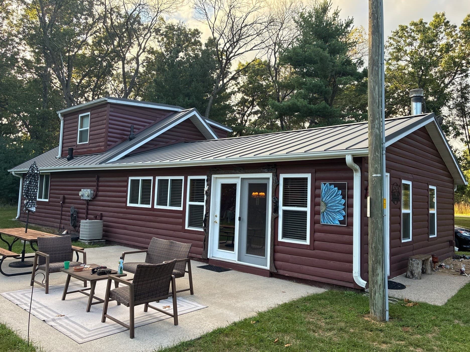Gallery photos for Shingles to Standing Seam Metal Roof on a Grand Marsh Log Home: Image #4